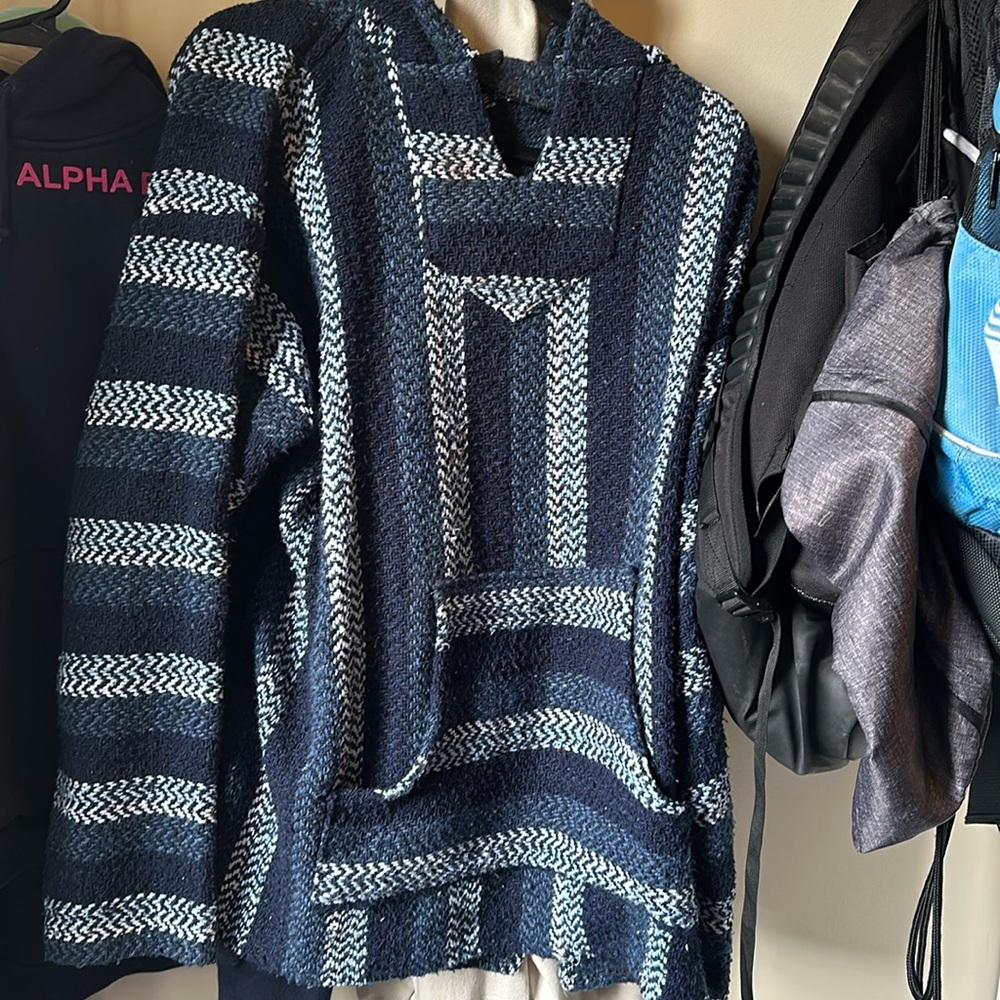 Really nice sweater (aka we used to call them drug rugs oops)